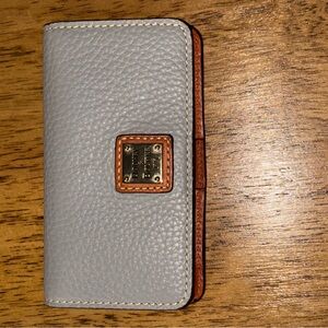 Dooney and Bourne smoke gray leather slim phone case.